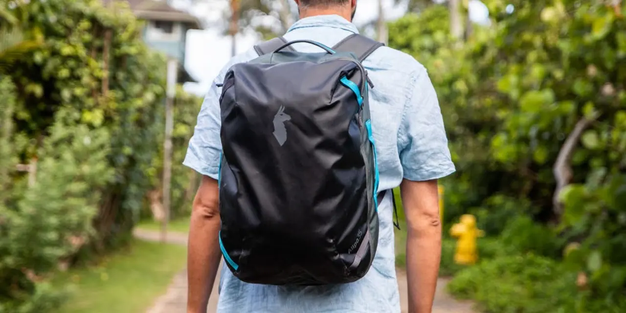 How to travel the world if I can't wear a backpack?